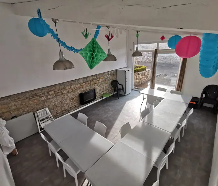 Large function room set up for a group meal