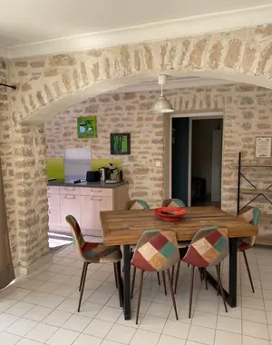 Stone-vaulted living area of Gîte Agora